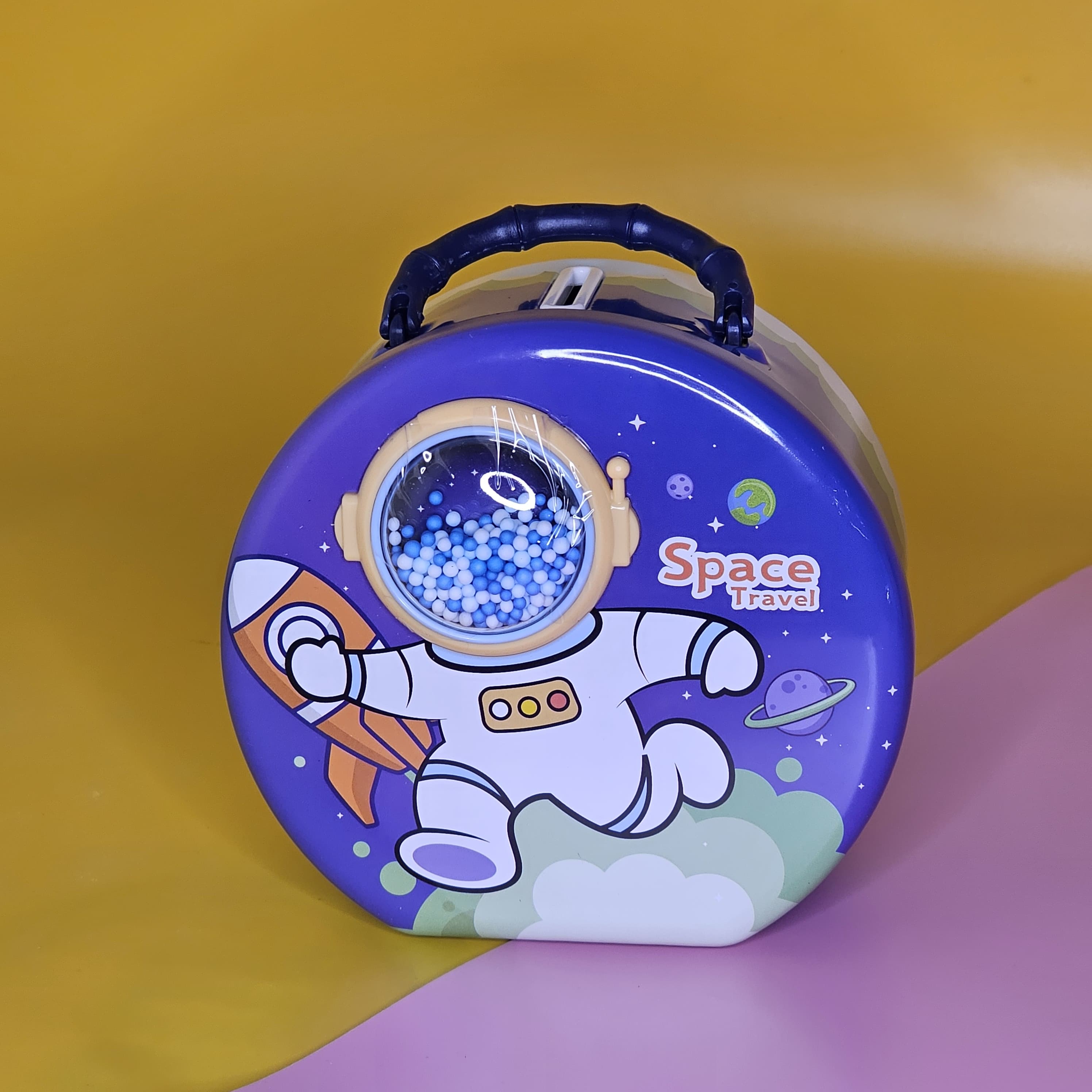 Space-Themed Metal Money Box with Lock & Key – Cute Astronaut & UFO Design Piggy Bank for Kids | Secure & Durable Savings Box with Transparent Coin Window | Ideal Return Gift for Birthdays, Parties & Special Occasions | Fun & Educational Gift for Children to Learn Money-Saving Habits | Available in Multiple Colors | Shop Now at www.usmile.toys